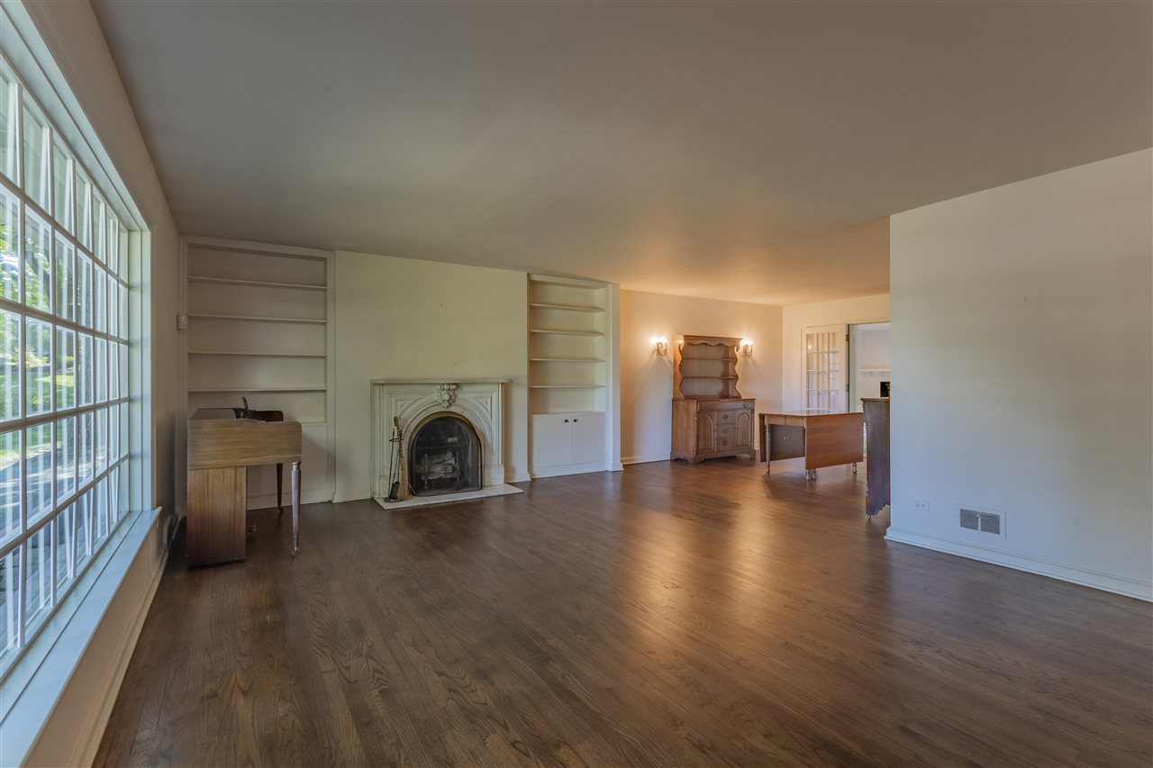 3307 Landstrom Road Rockford, IL 61107 - Photo 19 of 40 a view of a livingroom with a fireplace and window