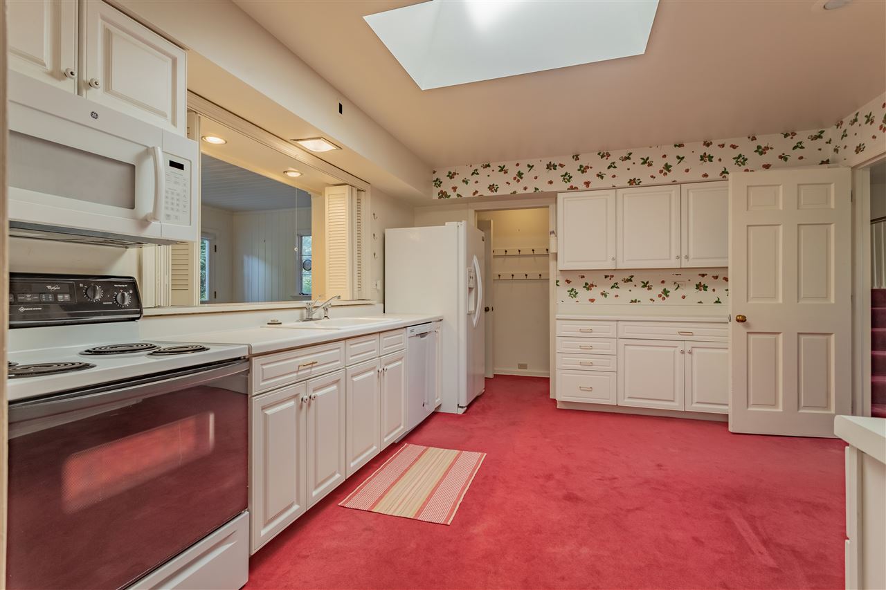 3307 Landstrom Road Rockford, IL 61107 - Photo 20 of 40 a kitchen with stainless steel appliances granite countertop a stove a sink and a refrigerator