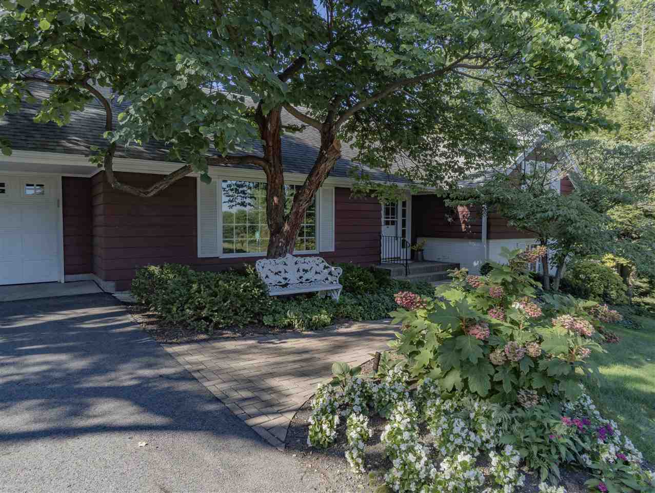 3307 Landstrom Road Rockford, IL 61107 - Photo 2 of 40 a front view of a house with garden