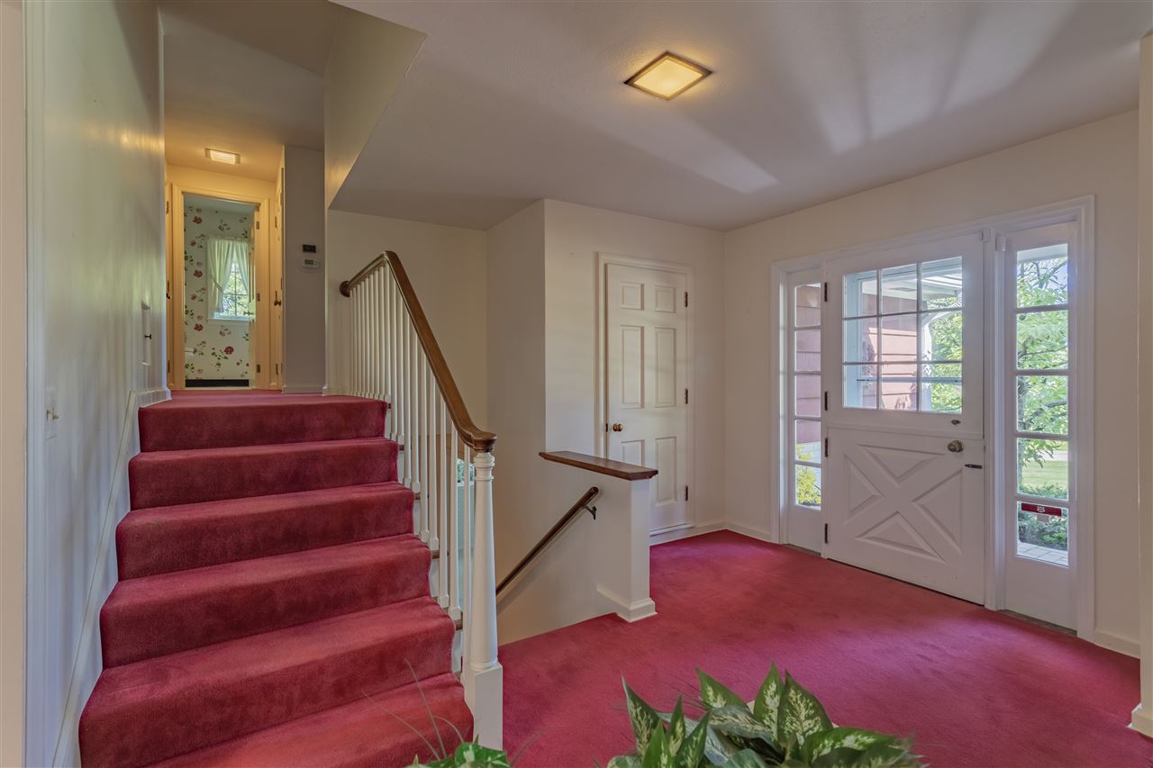 3307 Landstrom Road Rockford, IL 61107 - Photo 22 of 40 a view of entryway and hall with wooden floor