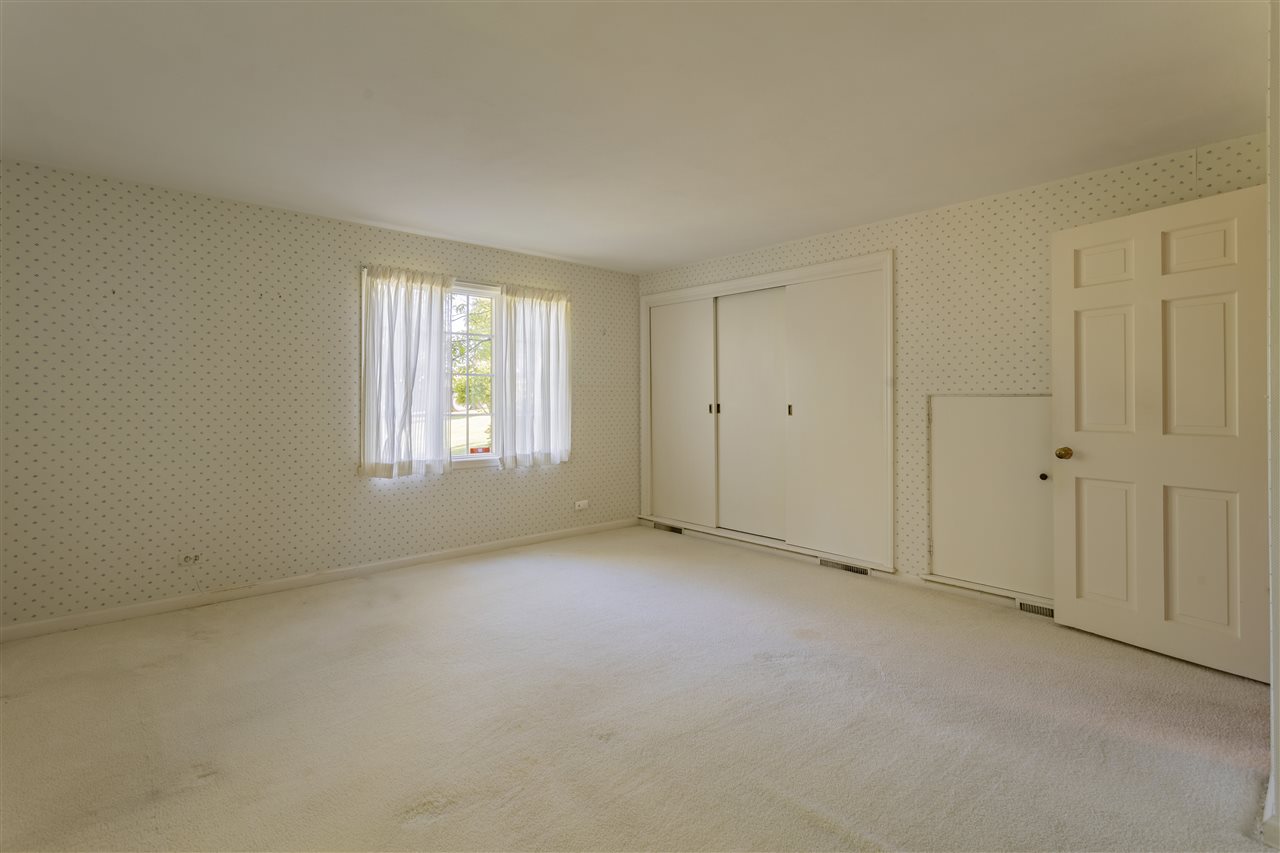 3307 Landstrom Road Rockford, IL 61107 - Photo 26 of 40 an empty room with windows and closet
