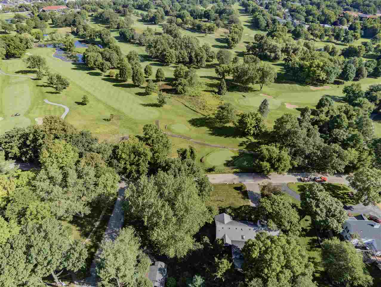 3307 Landstrom Road Rockford, IL 61107 - Photo 5 of 40 a view of a garden with a lake