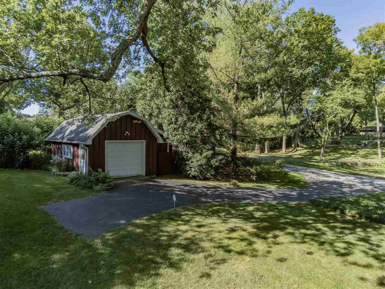 3307 Landstrom Road Rockford, IL 61107 - Photo 7 of 40 a front view of a house with a yard