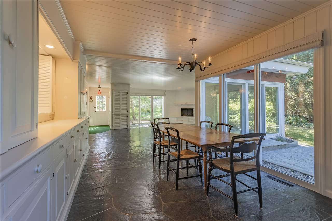 3307 Landstrom Road Rockford, IL 61107 - Photo 10 of 40 a view of a dining room with furniture window and wooden floor