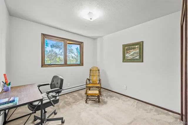 a room with a desk and chair