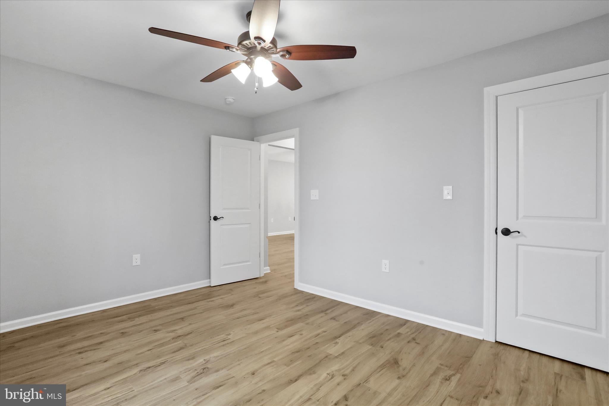 401 Bragg Drive Front Royal, VA 22630 - Photo 24 of 50 a view of an empty room with wooden floor