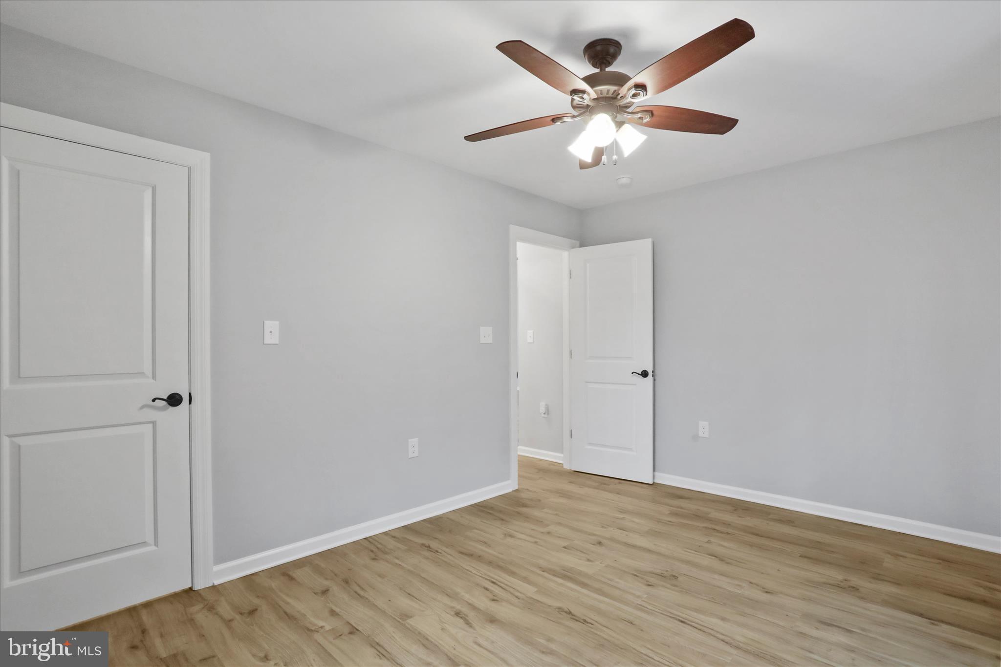 401 Bragg Drive Front Royal, VA 22630 - Photo 26 of 50 a view of an empty room with wooden floor