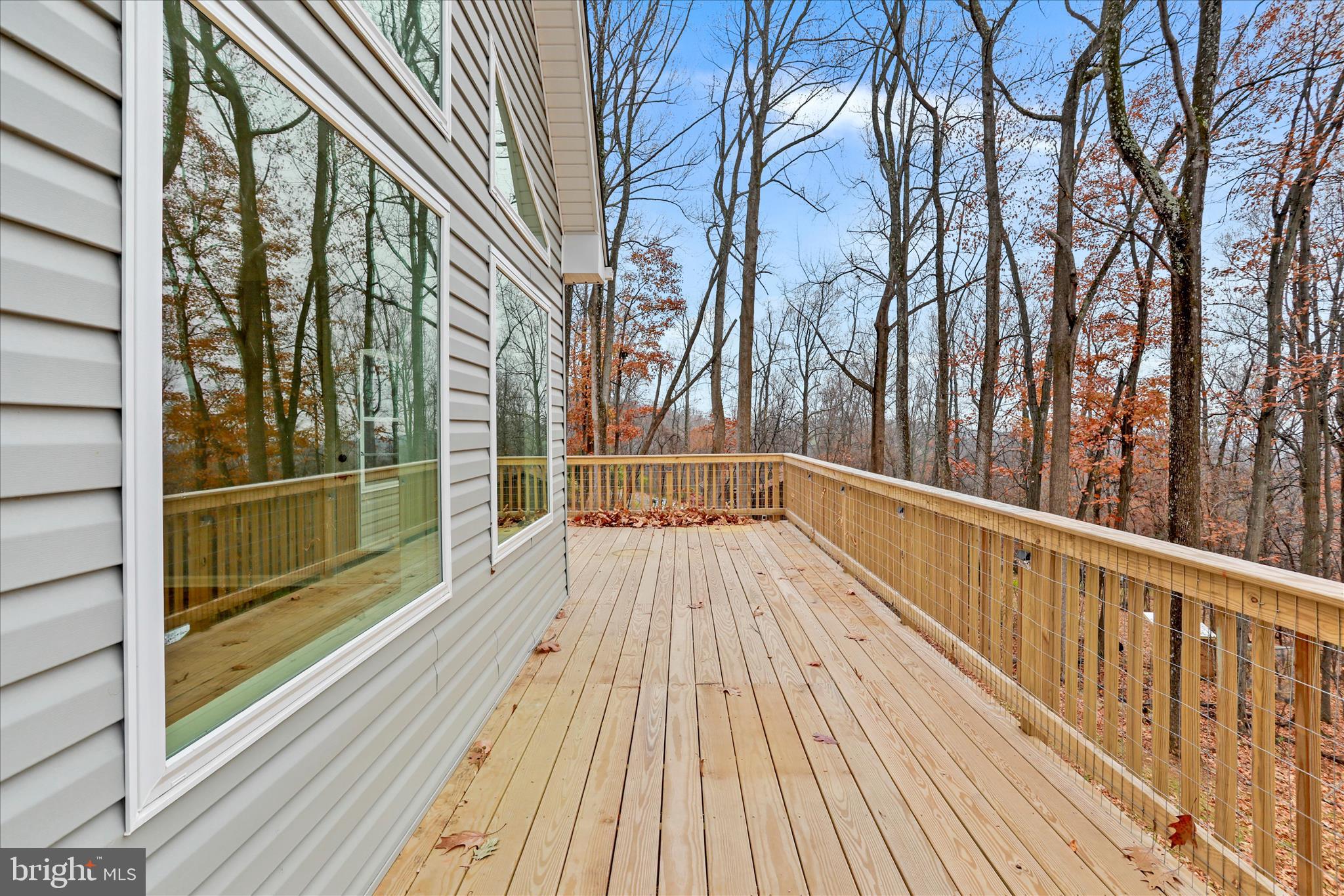401 Bragg Drive Front Royal, VA 22630 - Photo 40 of 50 a view of balcony with a large window and wooden floor