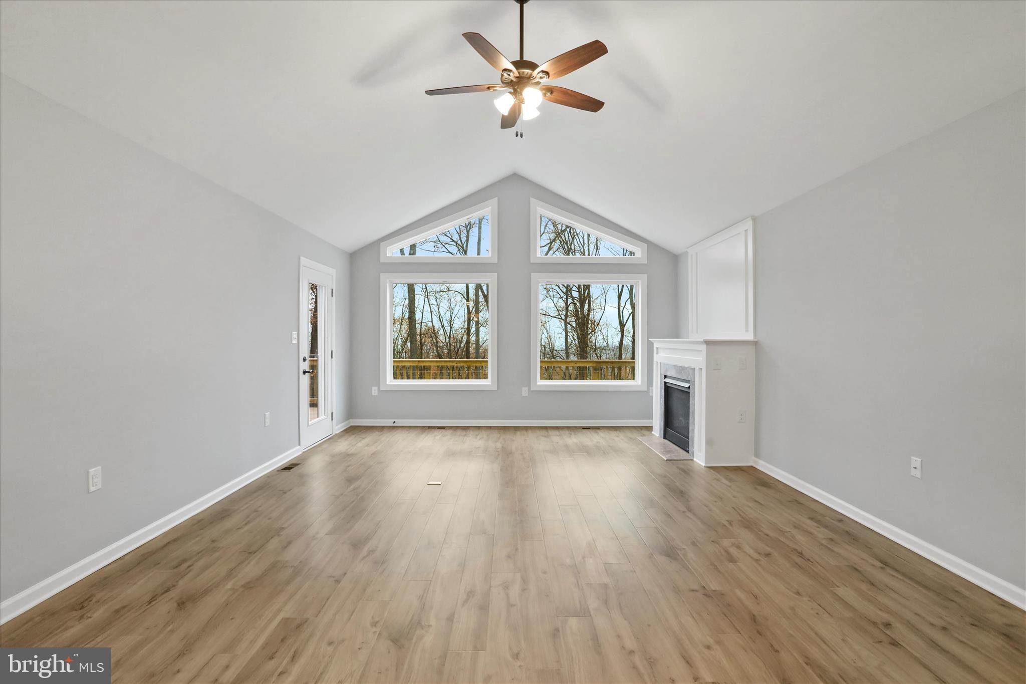 401 Bragg Drive Front Royal, VA 22630 - Photo 8 of 50 wooden floor in an empty room with a window