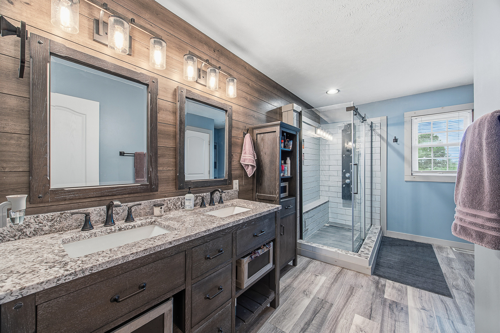 2 Bandecon Way Bloomington, IL 61704 - Photo 23 of 45 a spacious bathroom with a granite countertop sink mirror and a shower