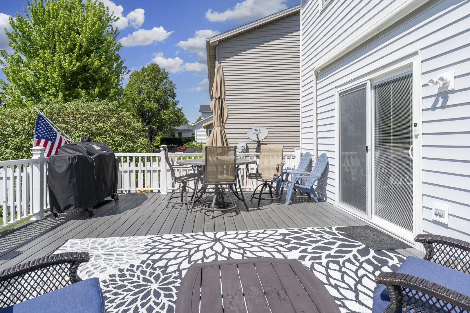 2 Bandecon Way Bloomington, IL 61704 - Photo 39 of 45 a view of a patio with a table and chairs and wooden floor