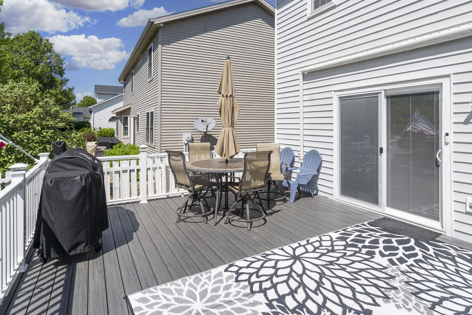 2 Bandecon Way Bloomington, IL 61704 - Photo 41 of 45 a view of a deck with table and chairs and wooden floor