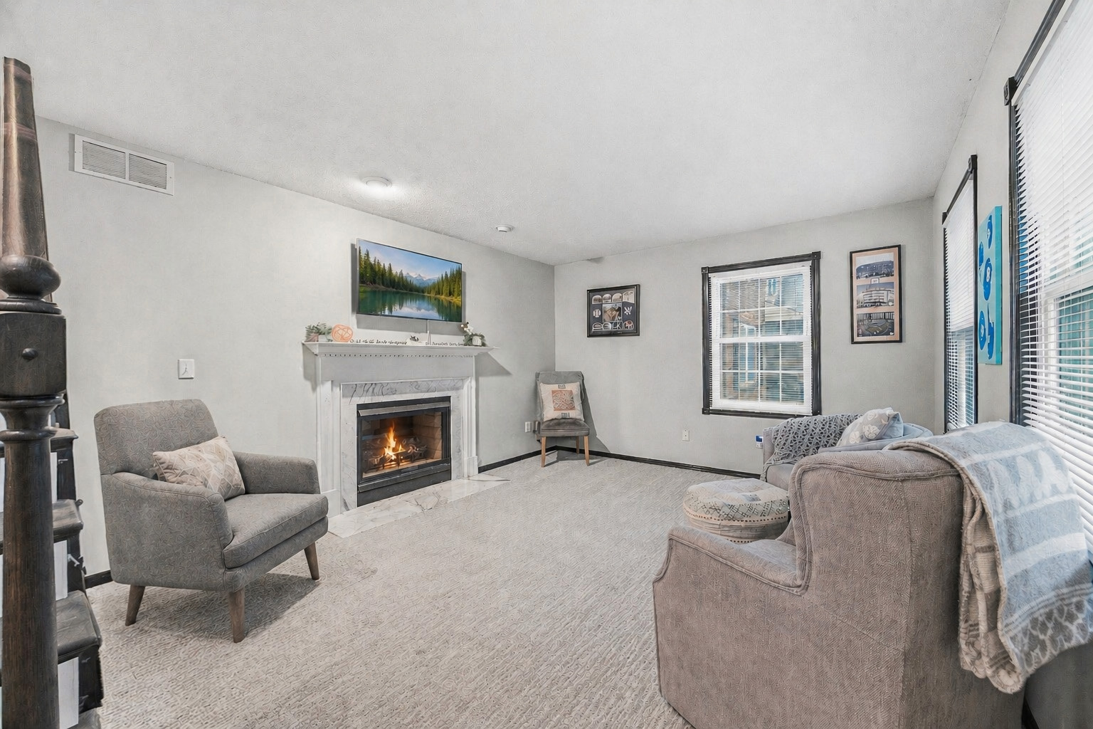 2 Bandecon Way Bloomington, IL 61704 - Photo 6 of 45 a living room with furniture and a fireplace