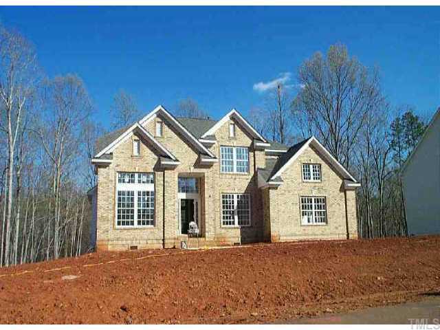 5228 Indigo Moon Way Raleigh, NC 27613 - Photo 1 of 1 a view of a house with a yard and garage