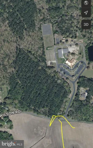 a view of a swimming pool with a yard