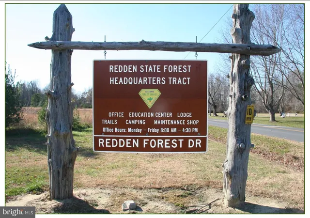 a sign broad on the side of the road