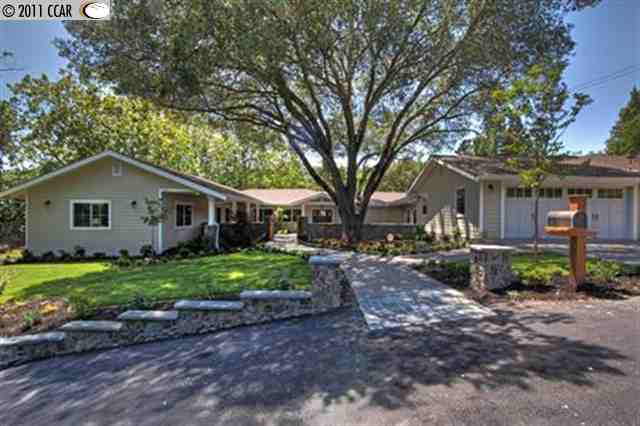 1182 Upper Happy Valley Road Lafayette, CA 94549 - Photo 1 of 1 a front view of a house with a garden