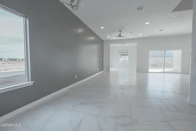 a kitchen with stainless steel appliances granite countertop a sink and cabinets