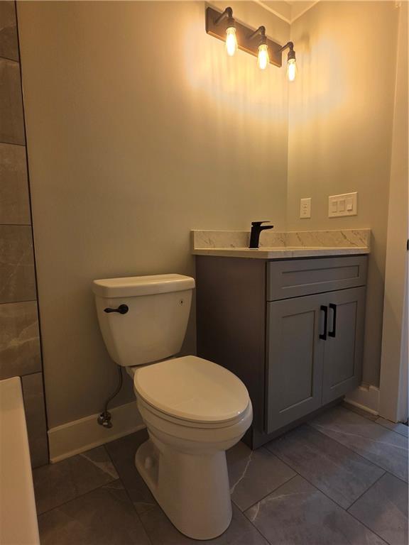 1217 Youngs Farm Road Cedartown, GA 30125 - Photo 18 of 29 a bathroom with a toilet and a sink