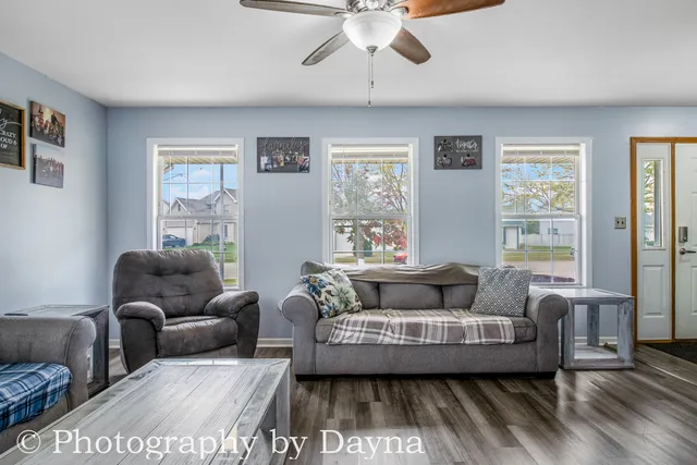a living room with furniture and a window