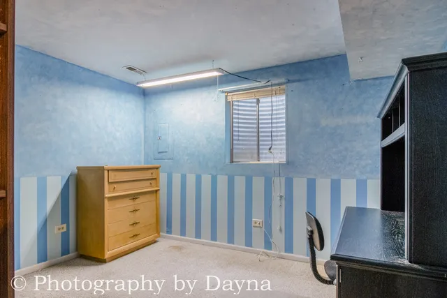 a view of cabinets with wooden floor