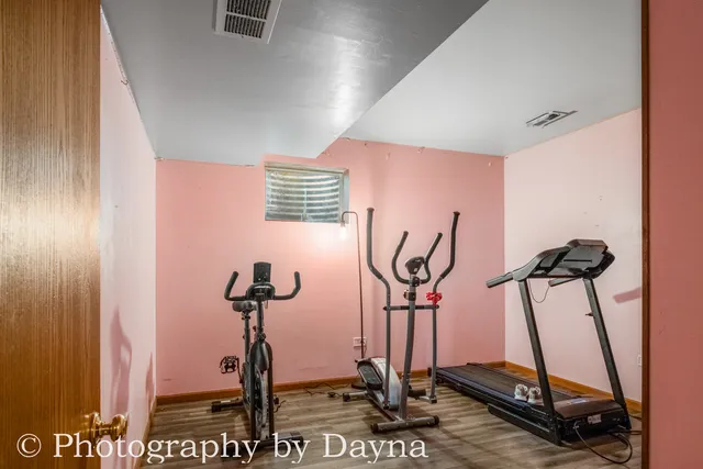 a view of a room with gym equipment