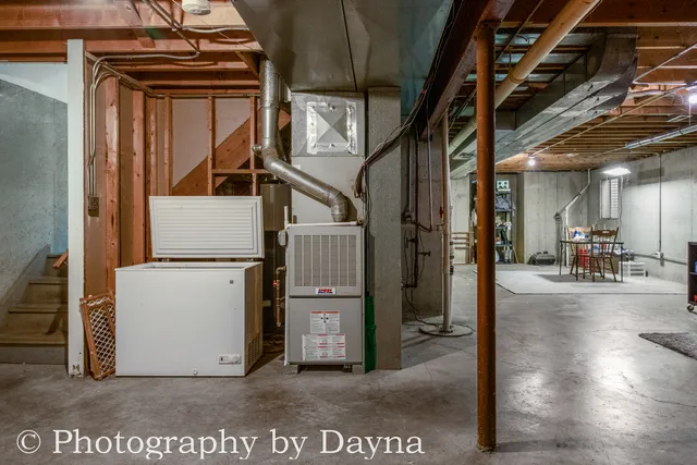 a view of a hallway with wooden floors