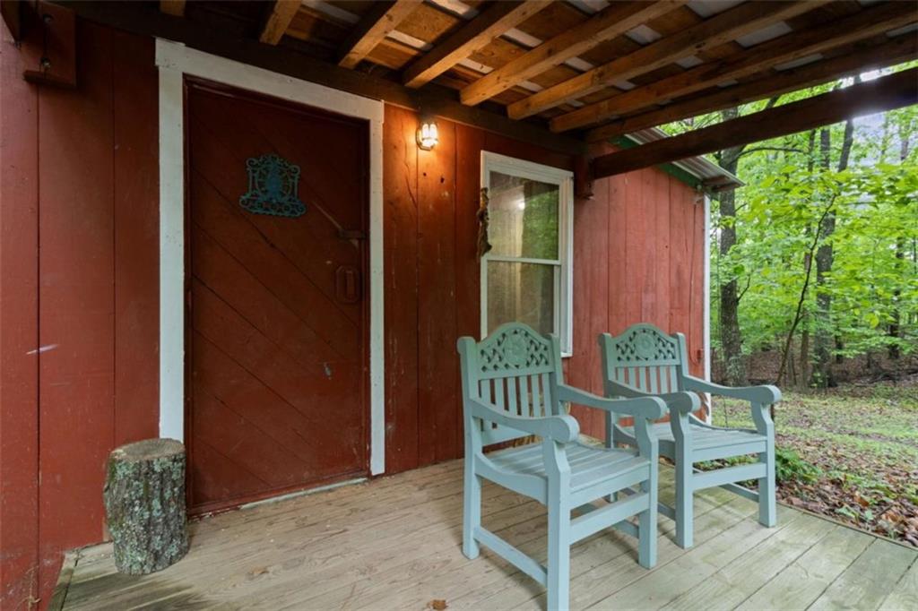 219 Raven Cliff Road Talking Rock, GA 30175 - Photo 63 of 77 a view of a chairs with a outdoor space