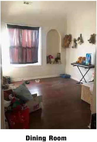 a kitchen with sink window and cabinets