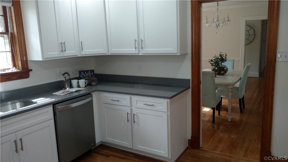 8316 Abbey Road Richmond, VA 23235 - Photo 7 of 15 a kitchen with a sink and cabinets