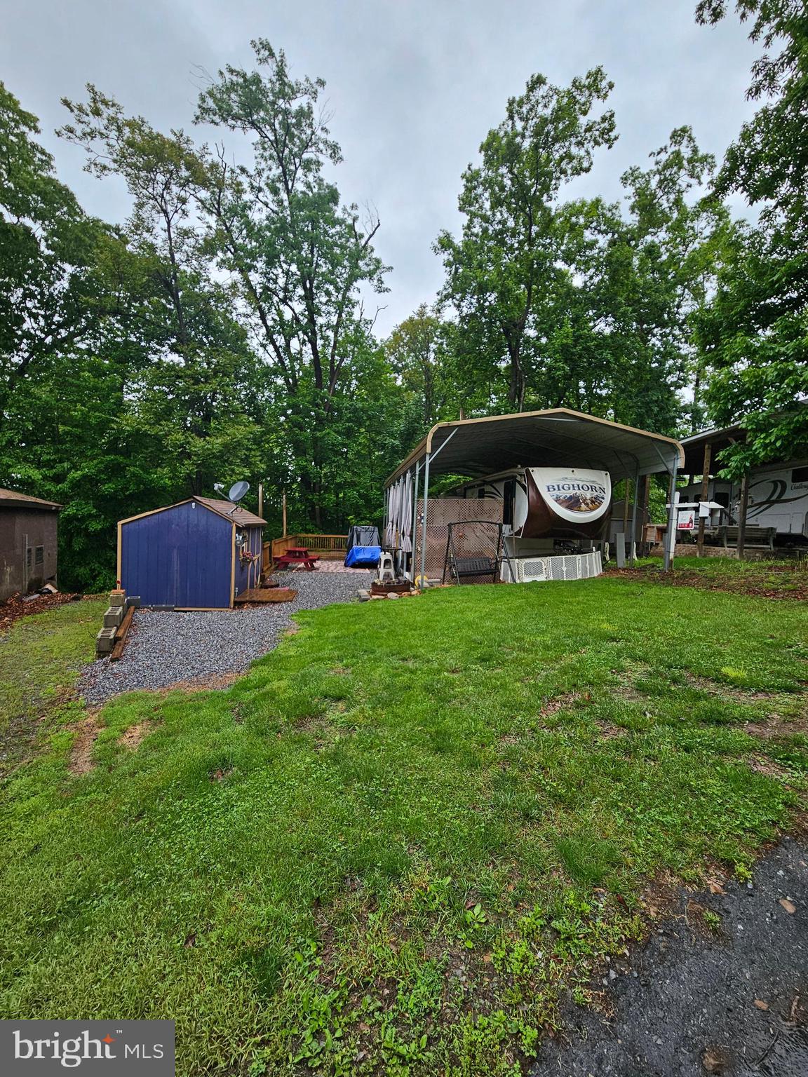 18 Hot Dog Road Falling Waters, WV 25419 - Photo 1 of 35 a house view with a sitting space and garden