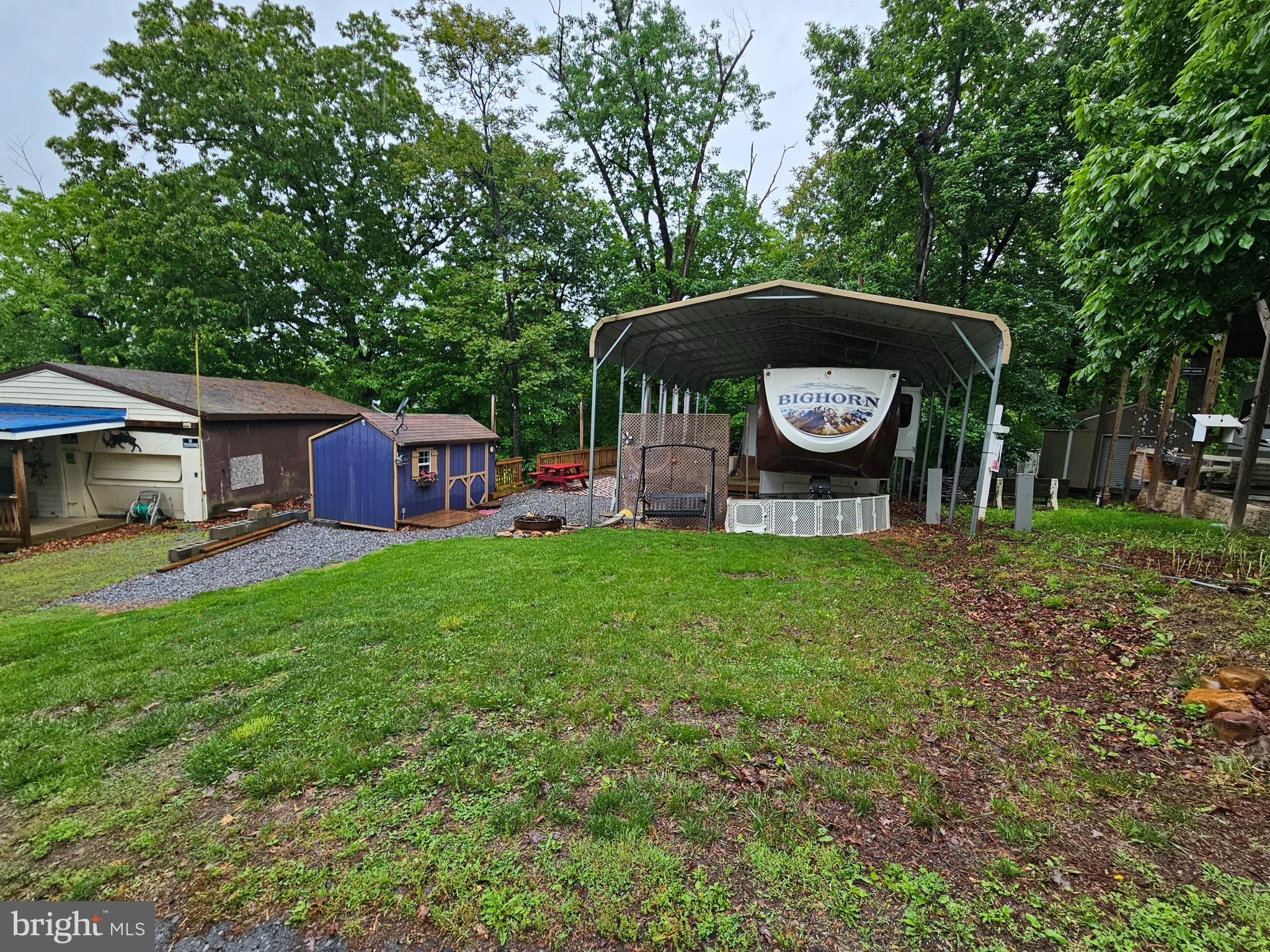 18 Hot Dog Road Falling Waters, WV 25419 - Photo 2 of 35 a front view of a house with yard and green space