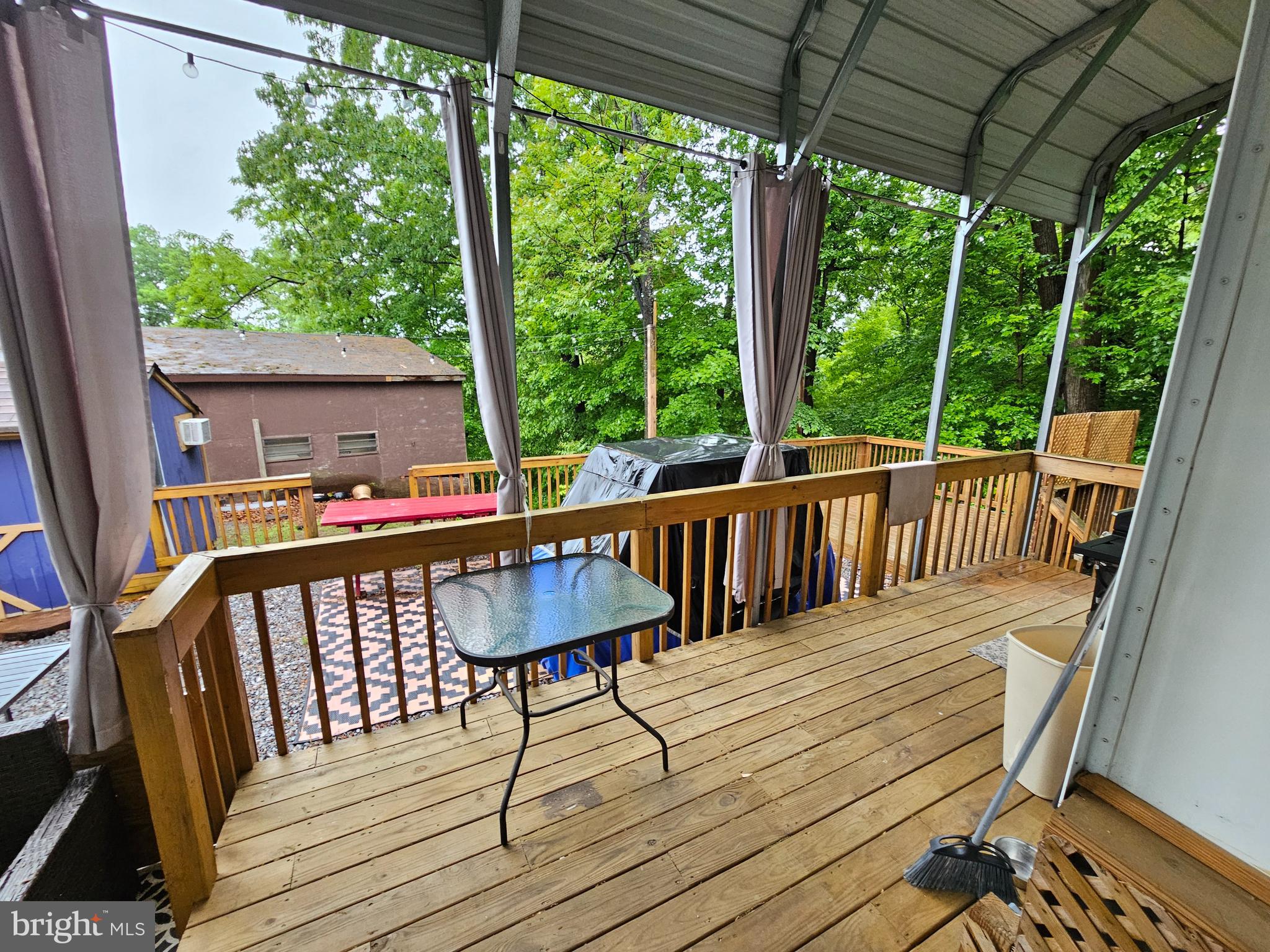 18 Hot Dog Road Falling Waters, WV 25419 - Photo 7 of 35 a view of a chairs on the roof deck