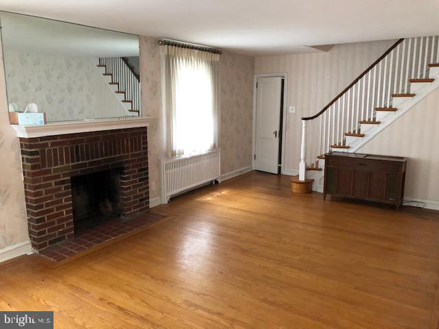918 Rhawn Street Philadelphia, PA 19111 - Photo 4 of 44 Large Liv. Rm., hw floors & brick fireplace
