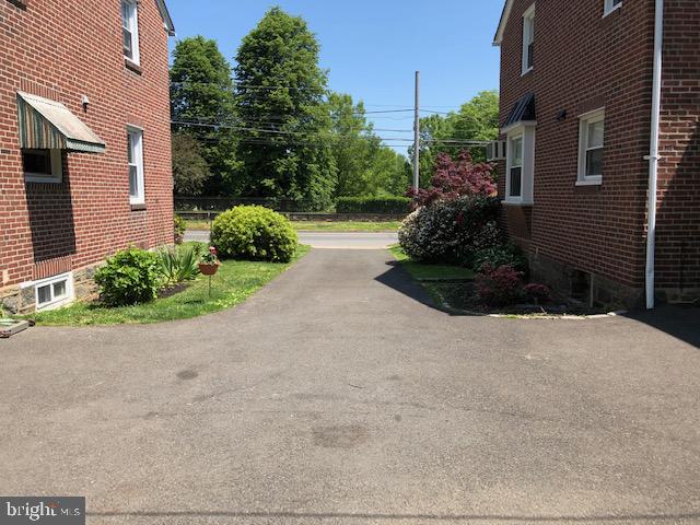 918 Rhawn Street Philadelphia, PA 19111 - Photo 36 of 44 Wide driveway - parking for 2 cars & 1 in garage