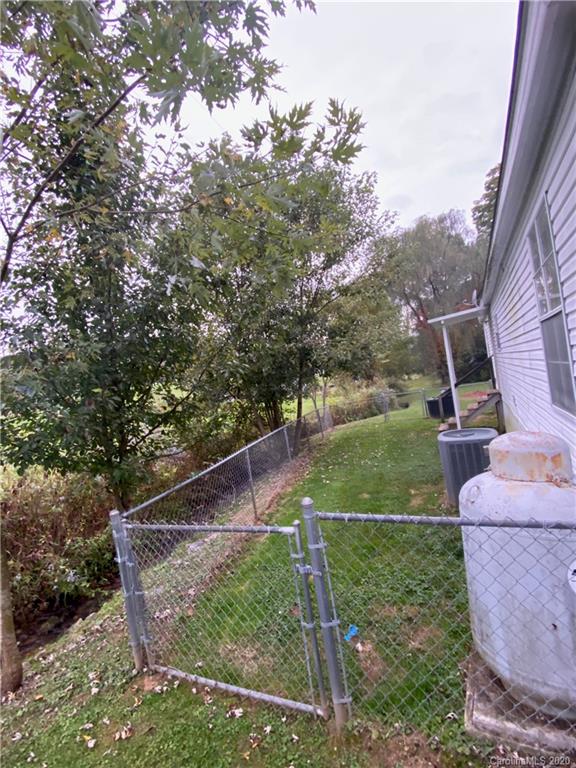 434 Dock Ratcliff Road Waynesville, NC 28786 - Photo 6 of 26 a view of a backyard with outdoor space