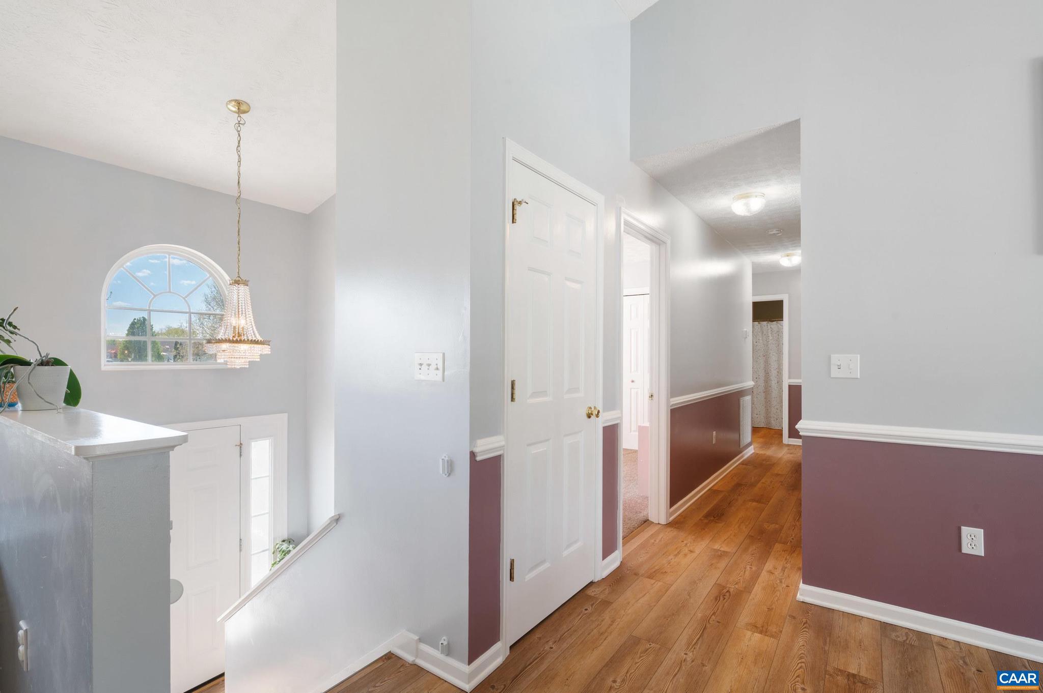 225 Mayfield La Waynesboro, VA 22980 - Photo 14 of 56 a view of a hallway with wooden floor and staircase