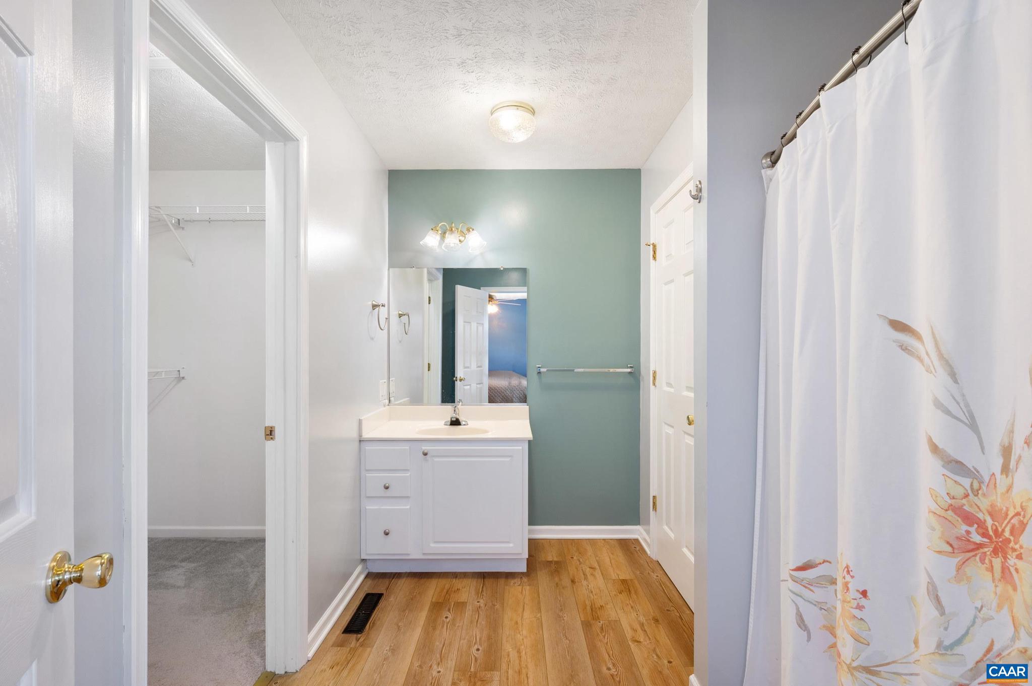 225 Mayfield La Waynesboro, VA 22980 - Photo 17 of 56 a bathroom with a sink mirror and shower