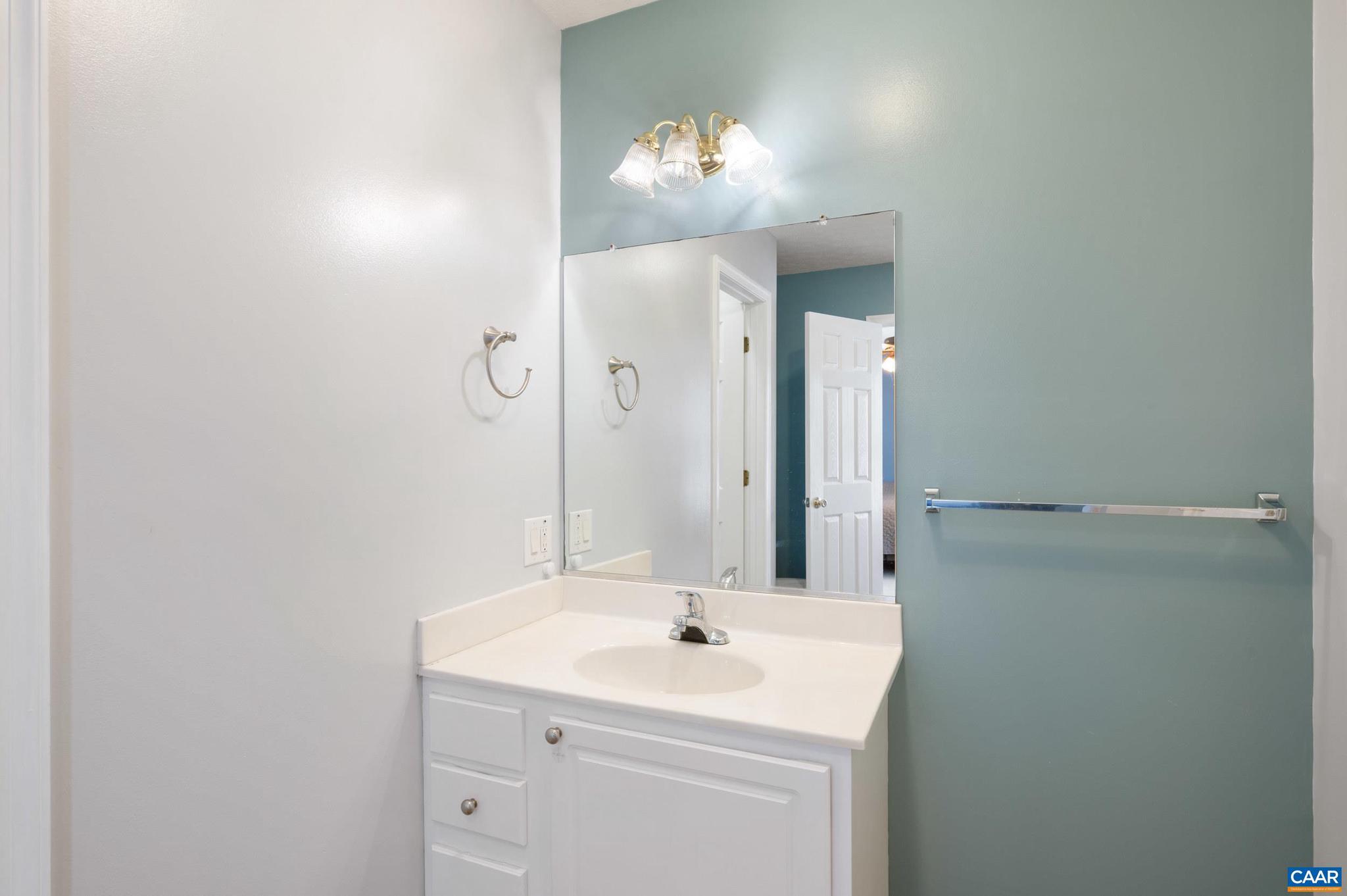 225 Mayfield La Waynesboro, VA 22980 - Photo 18 of 56 a bathroom with a sink and a mirror