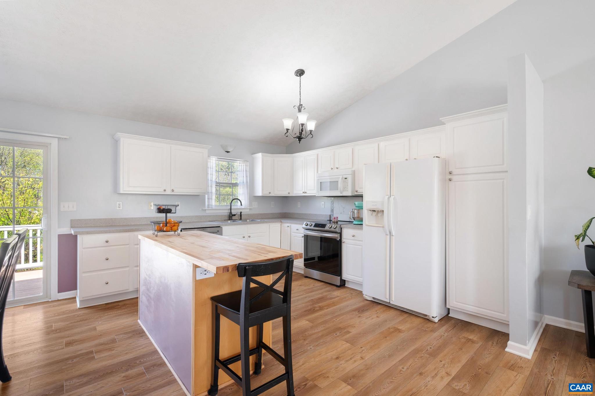 225 Mayfield La Waynesboro, VA 22980 - Photo 2 of 56 a kitchen with a stove a sink and a refrigerator