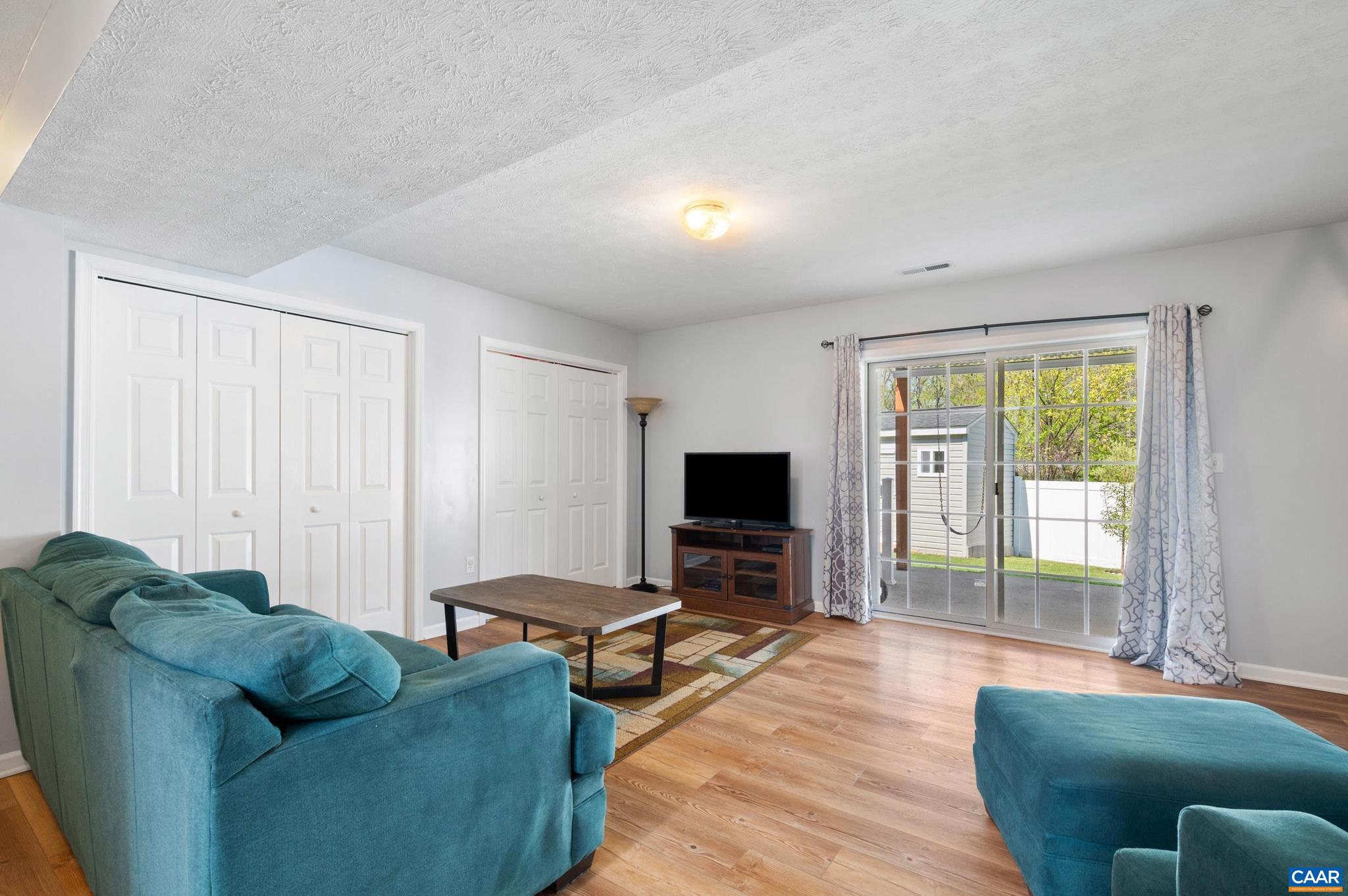 225 Mayfield La Waynesboro, VA 22980 - Photo 24 of 56 a living room with furniture and a flat screen tv