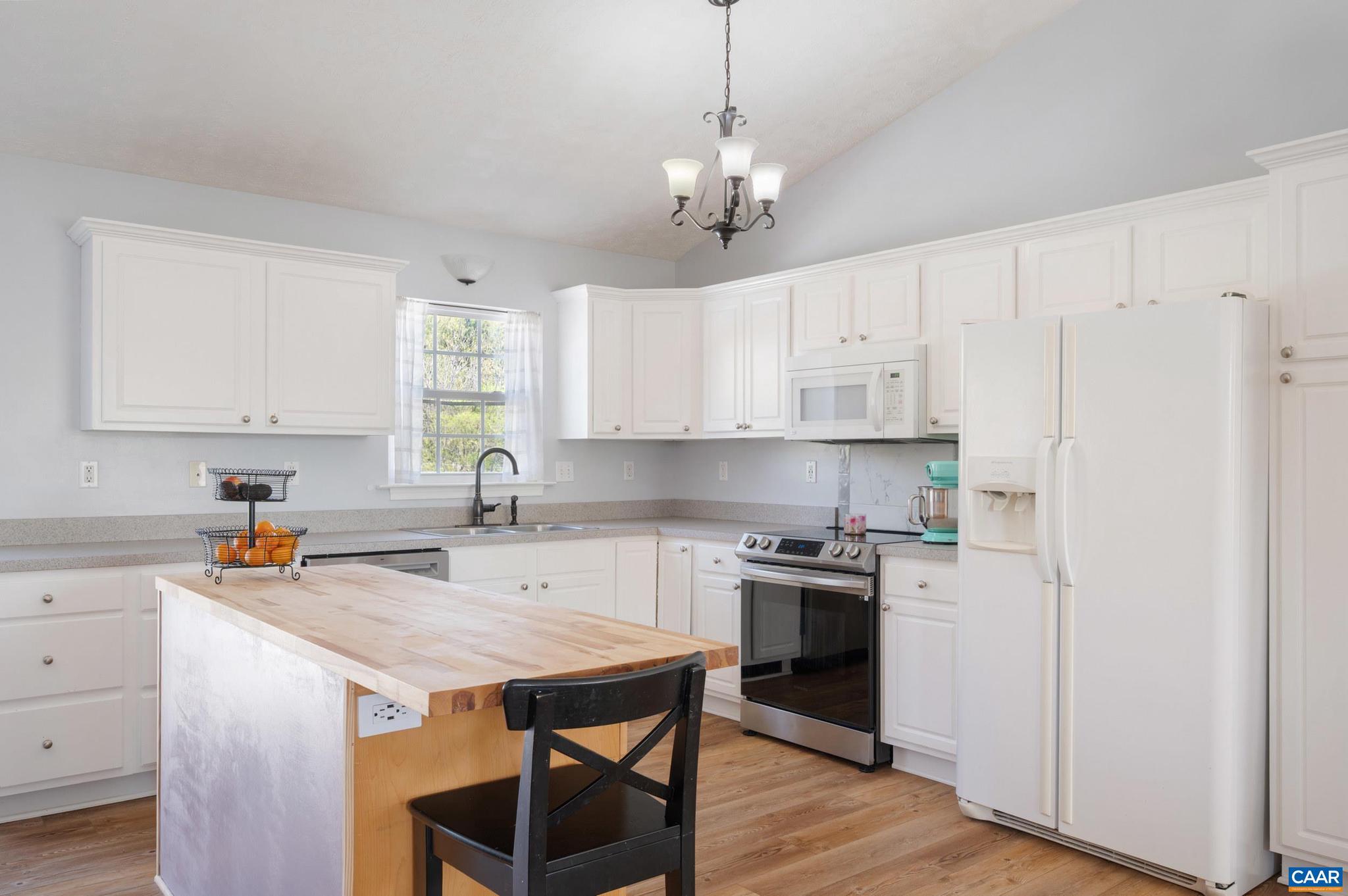 225 Mayfield La Waynesboro, VA 22980 - Photo 3 of 56 a kitchen with stainless steel appliances granite countertop a stove a sink dishwasher and a refrigerator with wooden floor