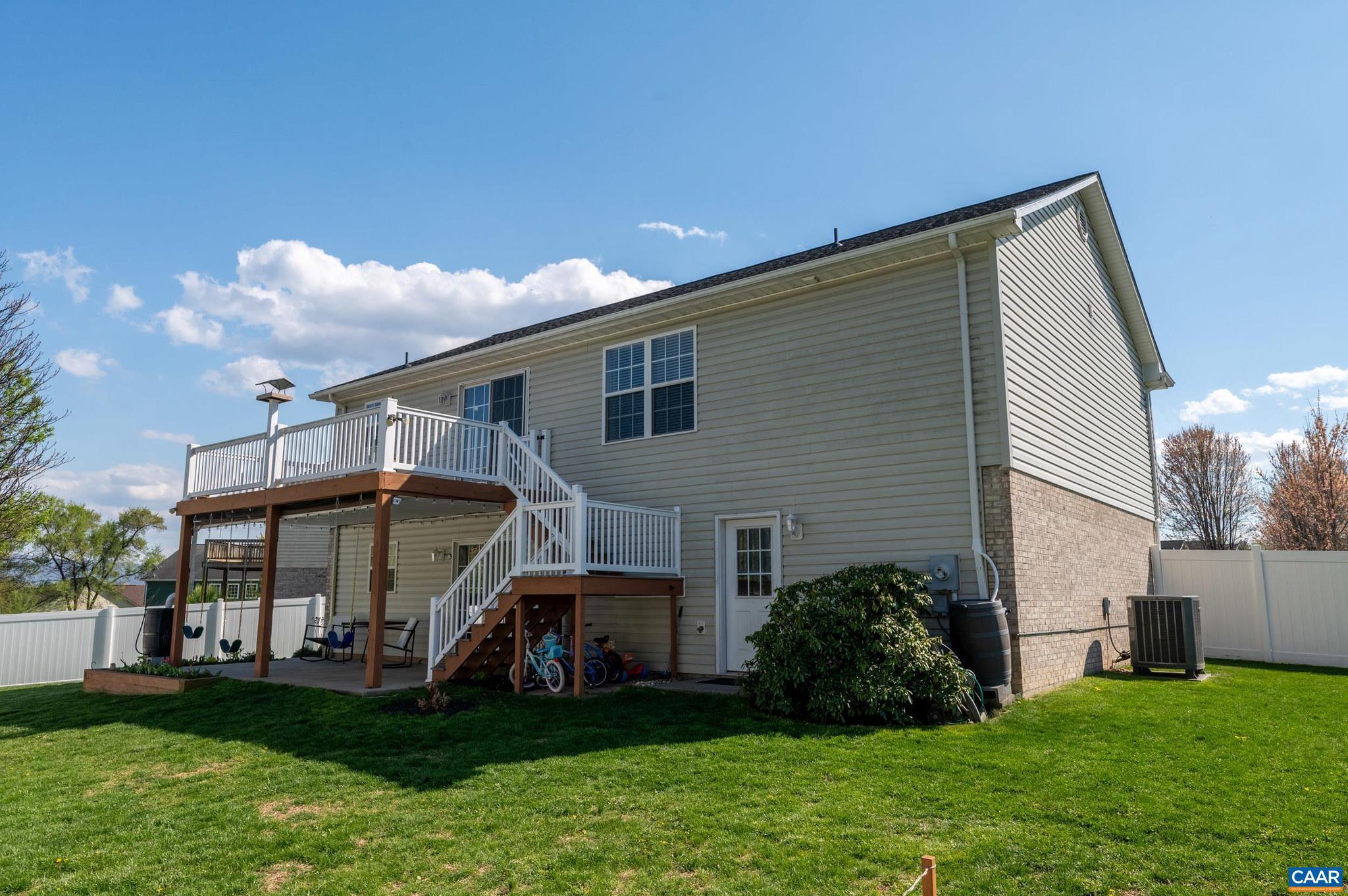 225 Mayfield La Waynesboro, VA 22980 - Photo 51 of 56 a front view of a house with a yard and potted plants