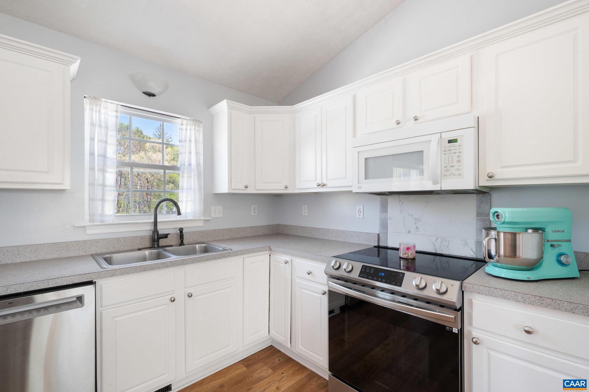 225 Mayfield La Waynesboro, VA 22980 - Photo 6 of 56 a kitchen with cabinets appliances a sink and a window
