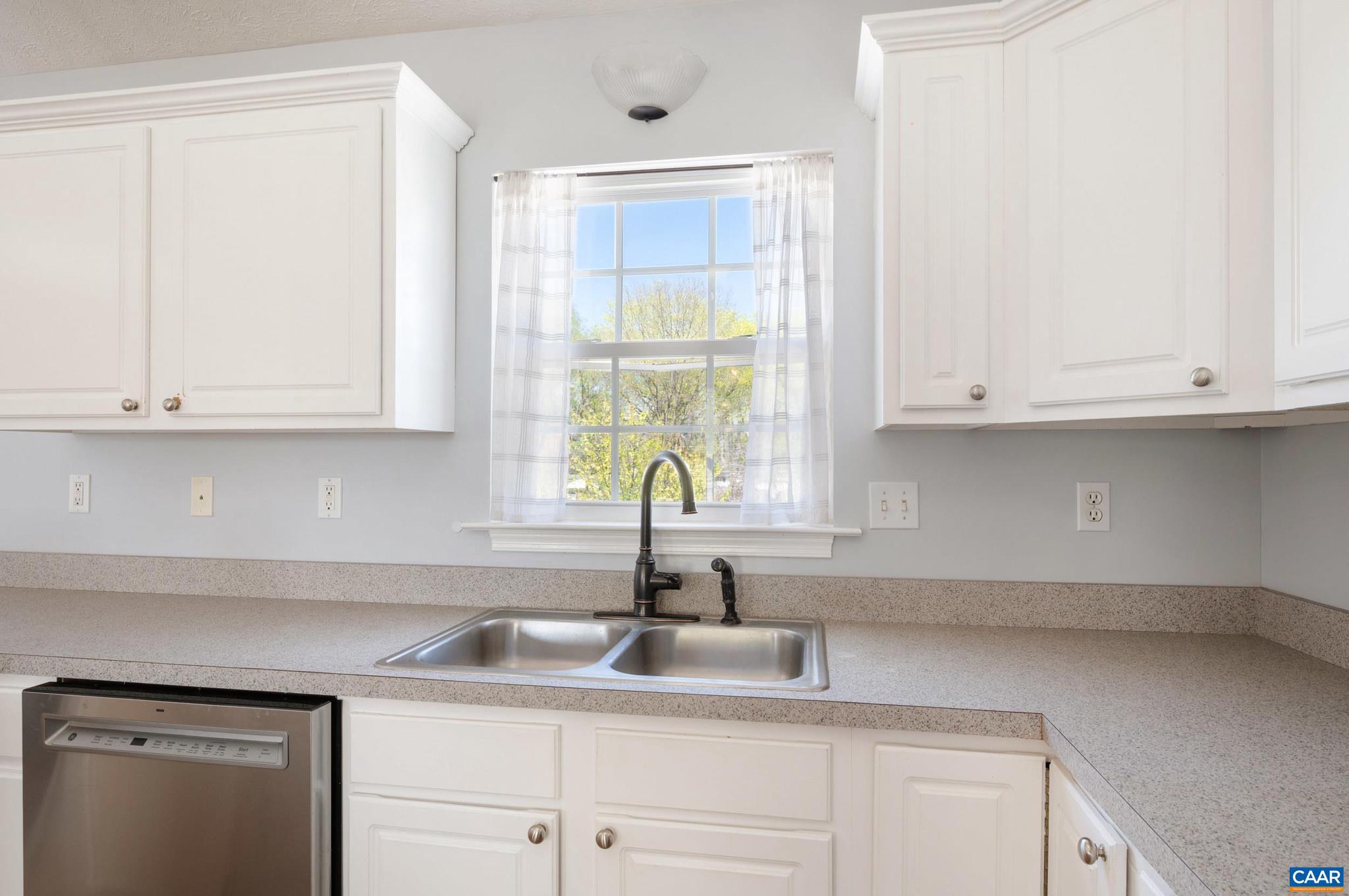 225 Mayfield La Waynesboro, VA 22980 - Photo 7 of 56 a kitchen with appliances cabinets and a window