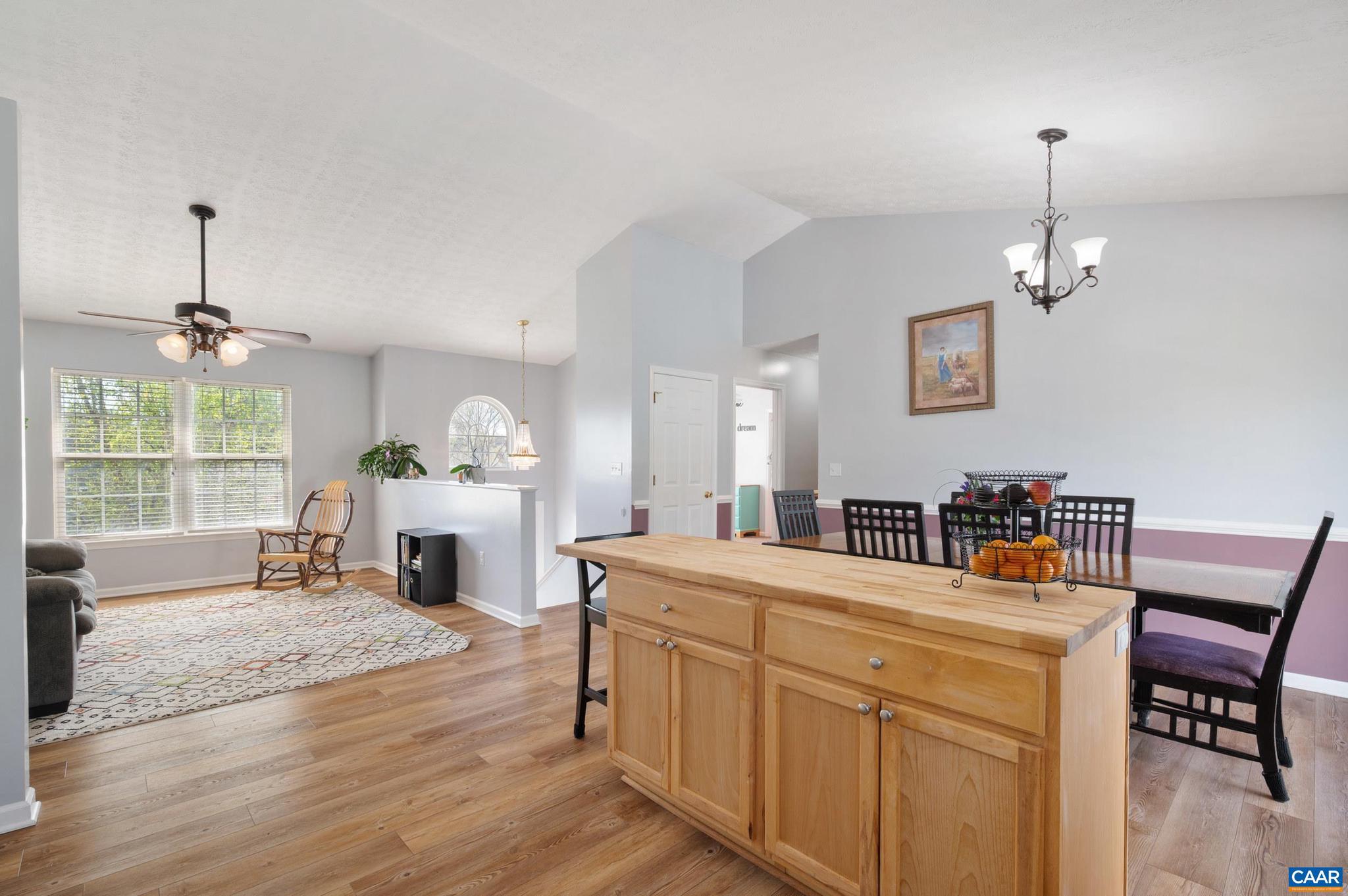 225 Mayfield La Waynesboro, VA 22980 - Photo 8 of 56 a living room with furniture a fireplace and a chandelier