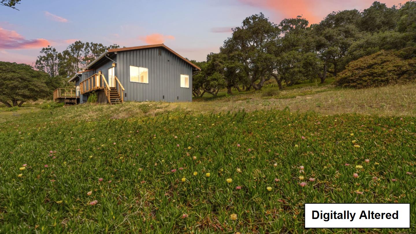 19269 Mallory Canyon Road, Unit D Salinas, CA 93907 - Photo 55 of 77 a front view of a house with a yard