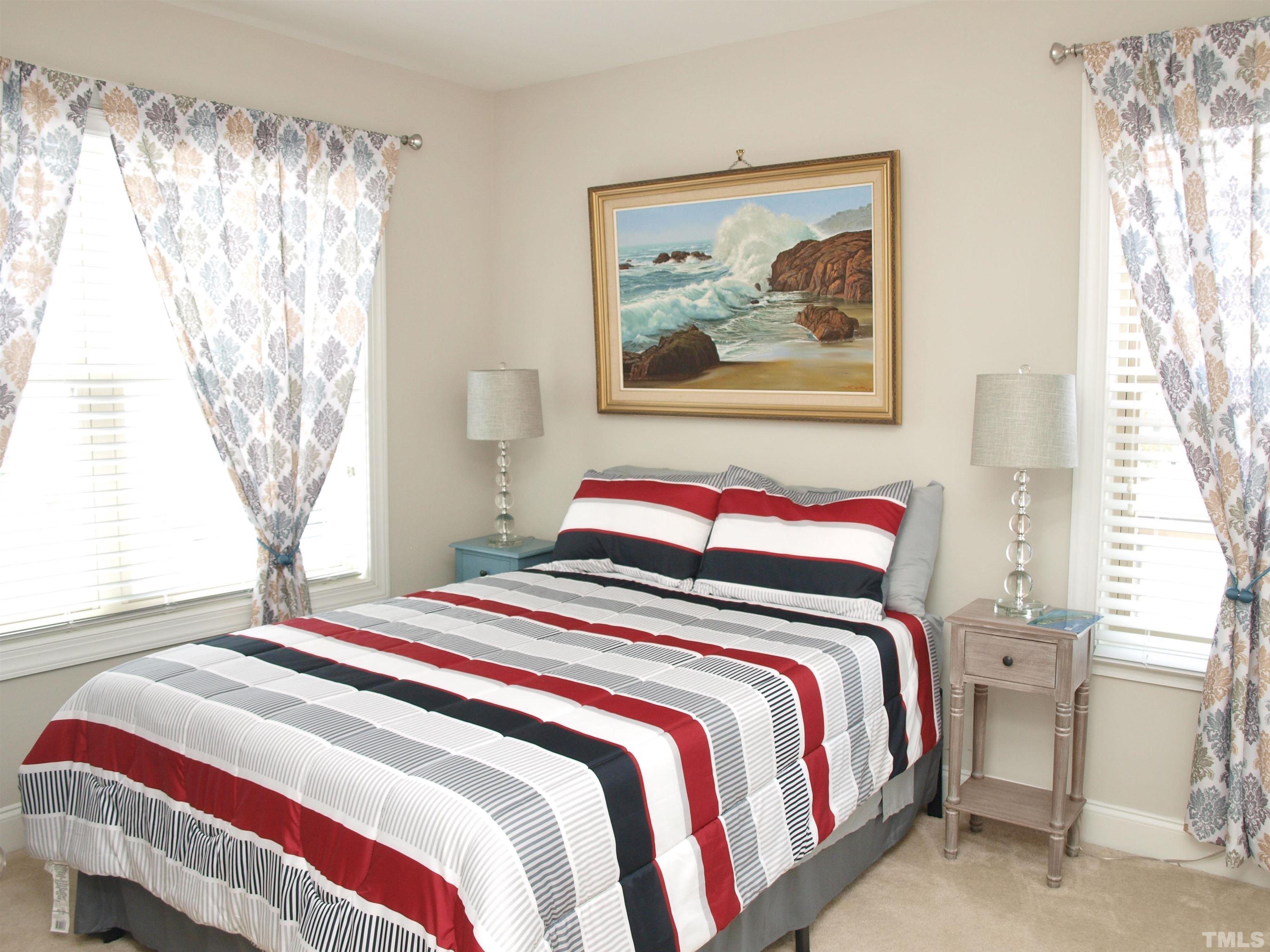 7613 Weathered Oak Way Raleigh, NC 27616 - Photo 13 of 22 Your guests will feel right at home here in this lovely bedroom.