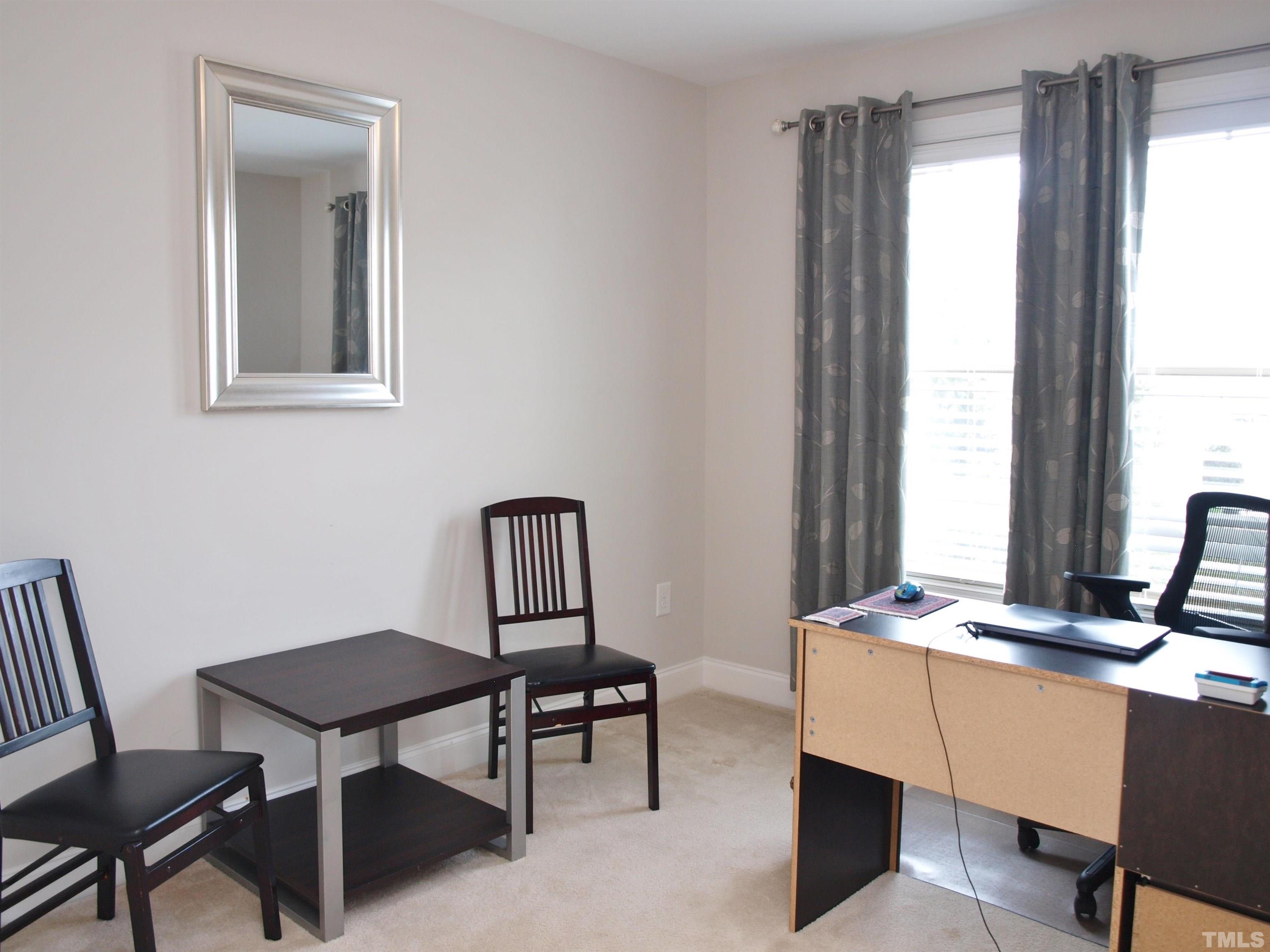 7613 Weathered Oak Way Raleigh, NC 27616 - Photo 14 of 22 This bedroom room can be used as another office or study.