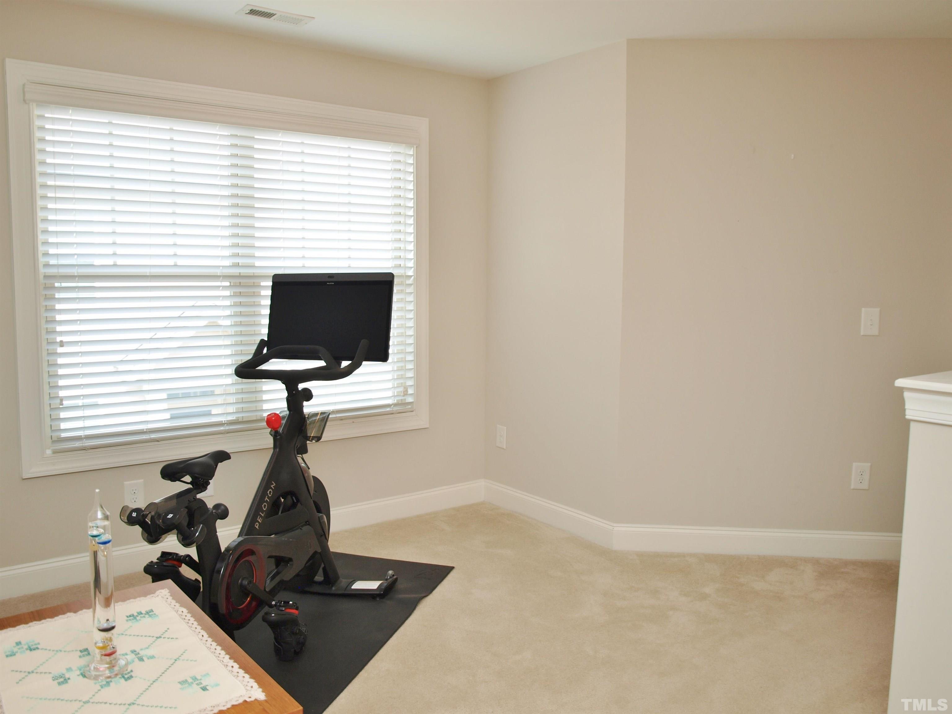 7613 Weathered Oak Way Raleigh, NC 27616 - Photo 17 of 22 Great size, light-filled loft area for exercise, playroom or just a comfy reading nook.